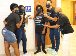 Girls with Cheyney University's Period Poverty Project 
