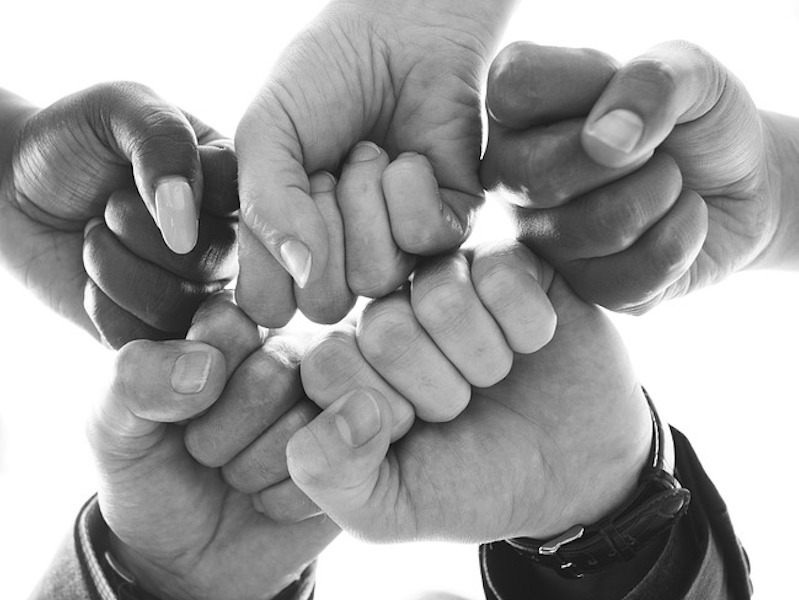 unity hands black and white